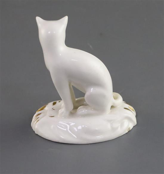 A rare Rockingham porcelain figure of a seated cat, c.1826,